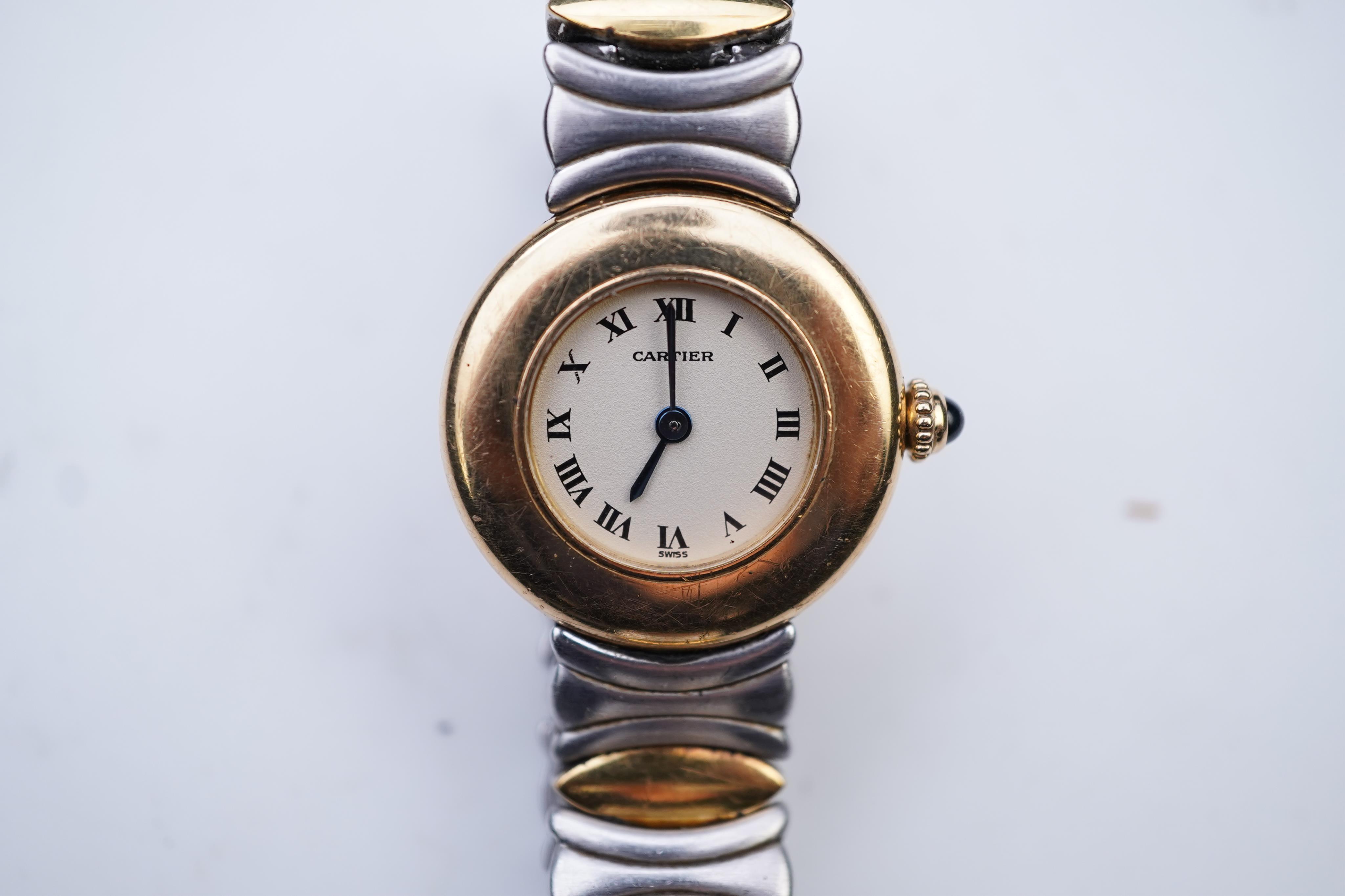 Cartier, a lady's gold and stainless steel wristwatch, 'Colisée', ref.8057908C